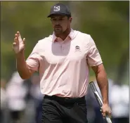  ?? SETH WENIG — THE ASSOCIATED PRESS ?? Bryson Dechambeau waves after his putt on the 15th hole during the first round of the PGA Championsh­ip at Oak Hill Country Club on Thursday in Pittsford, N.Y.