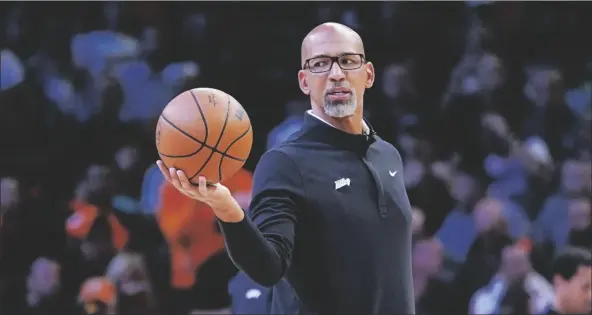  ?? MATT YORK/AP ?? PHOENIX SUNS HEAD COACH MONTY WILLIAMS hands off the ball during a break in the action during the first half of Game 2 in the second round of the Western Conference playoff series against the Dallas Mavericks on Wednesday in Phoenix.