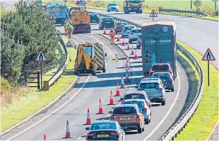  ?? Picture: Steve MacDougall. ?? Traffic queues build up near Ballinluig.