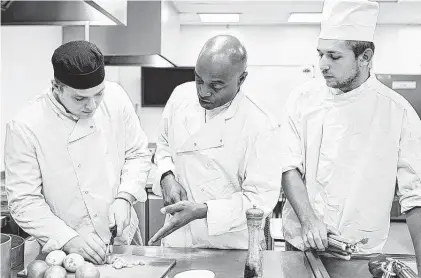  ?? Shuttersto­ck ?? Whether your son attends a cooking school to first learn the basics or learns from various types of cooks by working in a series of restaurant­s, he will be in a field of his choosing.