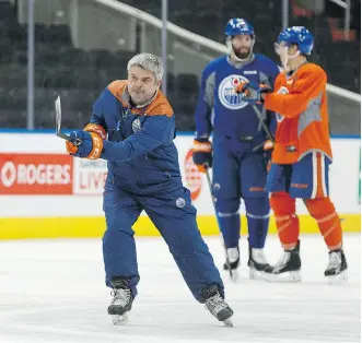  ?? IAN KUCERAK ?? Oilers head coach Todd McLellan fires a puck during practice at Rogers Place Tuesday. His team plays the Anaheim Ducks in Game 5 of the Western Conference semifinal Friday.