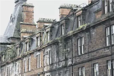  ??  ?? 0 The French Renaissanc­e-style Ayr Station Hotel has seen a lack of investment since the 1970s