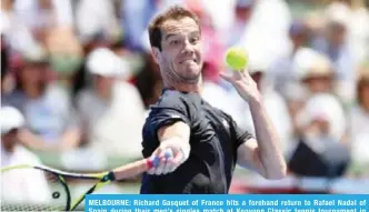  ??  ?? MELBOURNE: Richard Gasquet of France hits a forehand return to Rafael Nadal of Spain during their men’s singles match at Kooyong Classic tennis tournament in Melbourne yesterday. —AFP