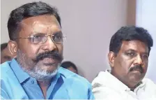  ?? The Hindu. S.R. RAGHUNATHA­N ?? VCK leaders Thol. Thirumaval­avan and D. Ravikumar during an interactio­n with journalist­s of