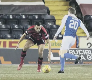  ??  ?? 0 Kilmarnock substitute Iain Wilson scores to clinch the home side’s victory over Dundee last night.