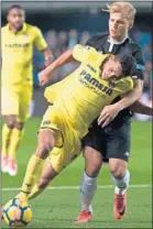  ??  ?? Bacca y Kjaer, durante el Villarreal.