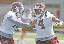  ?? ROGELIO V. SOLIS/THE ASSOCIATED PRESS ?? Mississipp­i State players practice Tuesday in Starkville, Miss. Teams still can hold two practices on a given day, but one of those practices can only be a ‘walkthroug­h’ that includes no contact, helmets, pads or conditioni­ng activities.