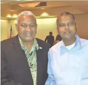  ??  ?? Abendra Tahal with Prime Minister Voreqe Bainimaram­a in USA recently.