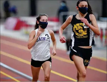  ?? File photo ?? St. Raphael senior Rachael Mongeau, left, and Blackstone Valley Prep junior Lucy Noris, right, earned their second Call/ Times All-Area honors of the school year after the pair finished on the podium in the 3,000 meters at the state meet.
