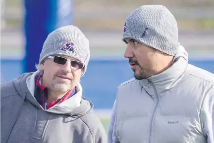  ?? DARIO AYALA/MONTREAL GAZETTE FILES ?? Alouettes general manager Jim Popp, left, says he believes the team still looks very strong despite some off-season player losses and a shuffled coaching staff, including former star quarterbac­k Anthony Calvillo, right, who makes his debut as receivers...