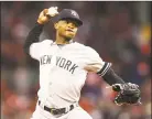  ?? Adam Glanzman / Getty Images ?? The Yankees’ Domingo German pitches in the first inning against the Red Sox on Friday at Fenway Park.