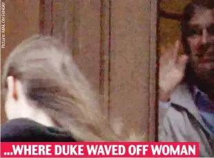  ??  ?? Visitor: Andrew peers around the same door at Epstein’s house in 2010 ...WHERE DUKE WAVED OFF WOMAN