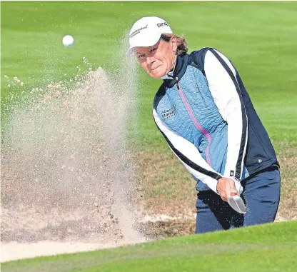  ?? Picture: Getty Images. ?? To the rescue: Catriona Matthew plays a bunker shot on the 8th hole at Gleneagles.