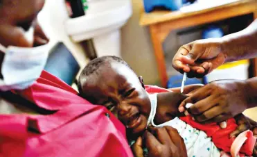  ?? ?? ▴Malaria causes 608,000 deaths each year 95% of them in Africa. One of the two approved vaccines, labelled RTS,S, has been piloted on a large scale in Ghana, Kenya and Malawi, and Cameroon will be the first of 12 African countries that will begin administer­ing doses this year.