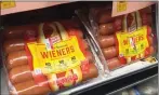  ?? AP PHOTO/CANDICE CHOI ?? In this June 28 photo, Oscar Mayer classic uncured wieners are for sale at a grocery store in New York.