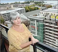 ??  ?? Builders of the Innovation Centre were busy altering plans for the rooftop, to accommodat­e a nightclub, much to the dismay of nearby highrise owner Florrie McCallum. Kelowna city council wisely blocked the nightclub plan.