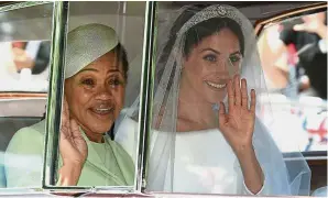  ?? — AFP ?? Fresh breath of air: Both Meghan and her mother Doria displayed their strong identity as independen­t women and took pride in their AfricanAme­rican heritage at the royal wedding.
