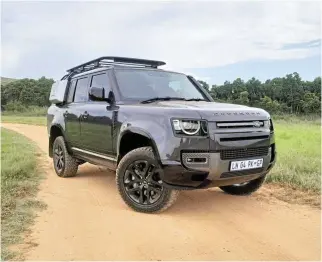  ?? ?? Left: The Defender Outbound comes engineered for hacking through forests in luxury. Below left: The side panels and optional snorkel create a Defender fit for inhospitab­le terrain. Below far left: The five-seater has a cavernous boot.