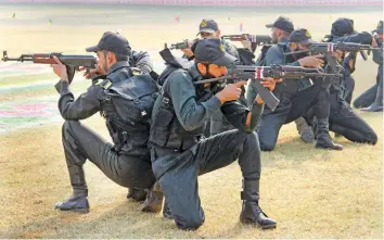  ?? — PTI ?? Police personnel perform a drill during the attestatio­n- cum- passing out Parade of 25th BRTC Batch of the J& K police at SPS Police Training College in Kathua on Wednesday.