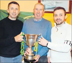  ?? (Pic: P O’Dwyer) ?? Johnny O’Callaghan with his sons, Jonathan and Mark, members of the Castletown­roche panel that won the JB1 Hurling Championsh­ip in 2023, at the medal presentati­on on Friday night.