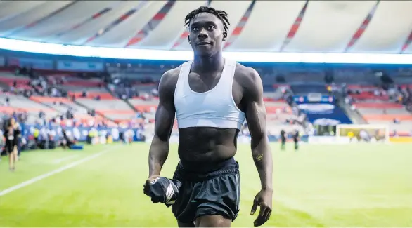  ?? DARRYL DYCK/THE CANADIAN PRESS/FILES ?? Whitecaps forward Alphonso Davies is one of 16 athletes who appear in the new Nike ad that prompted many Americans to burn their gear.