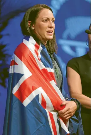  ?? PHIL WALTER/ GETTY IMAGES ?? Sophie Pascoe carried the flag in the Commonweal­th Games opening ceremony yesterday.