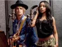  ??  ?? Tinashe joins Cody Simpson in a promotiona­l image for Denim & Supply Ralph Lauren. “I was thrilled to even be considered,” she said.