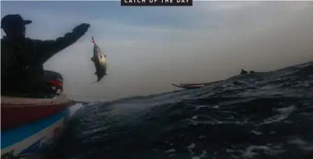  ?? | EPA ?? A FISHERMAN catches a fish at dawn in the Atlantic Ocean off the 400-year-old fishing village of Ngor, Dakar, Senegal, yesterday.