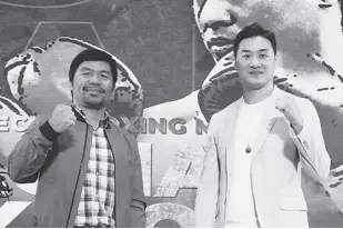  ?? ROY DOMINGO ?? BOXING icon Manny Pacquiao and Korean DK Yoo pose during Thursday’s media conference.