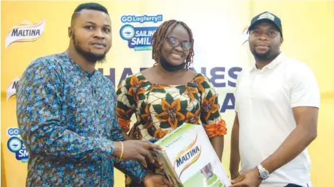  ??  ?? Trade Marketing Manager, Strategic Programmes, Nigerian Breweries Plc, Charles Nwachukwu; Prize Winner, Mrs. Titilayo Igunnu and Founder of Energycity Ltd ( Elivate9ja Raffles), George Ogan at the Maltina Lagos State Ferry Services Raffle Draw held at Ipakodo Ferry Terminal, Ikorodu, Lagos.