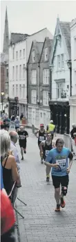  ??  ?? Runners in the Durham 10k last night. Pictures by Tim Richardson.