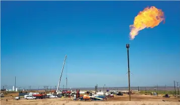  ?? ROBIN ZIELINSKI/LAS CRUCES SUN-NEWS ?? A methane flare on a ranch in southern New Mexico. There is great debate among state officials, industry and environmen­tal groups over how much is actually released.