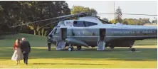  ?? AP PHOTO ?? HEADING OUT: President Trump and first lady Melania Trump approach Marine One to begin their trip.