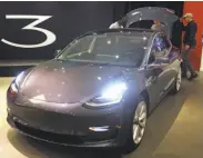  ?? Scott Strazzante / The Chronicle 2018 ?? The Tesla Model 3 far outsold the runner-up, the Toyota Prius Prime, in April.