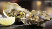  ??  ?? Shell ’em cheap: Six oysters now cost £1.50