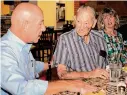  ?? Yi-Chin Lee/Staff photograph­er ?? John Whitmire chats with WWII veteran Kenneth Thompson at his 97th birthday lunch Tuesday.