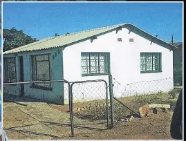  ??  ?? HUMBLE BEGINNINGS Oti’s first home in Mabopane Township on the outkirts of Pretoria. The family later moved to a more affluent area