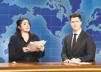  ?? Will Heath / NBC ?? Cecily Strong appears as Claire from NBC Human Resources with Colin Jost during a “Weekend Update” skit on “Saturday Night Live.”