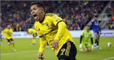  ?? Carolyn Kaster/Associated Press ?? Crew forward Cucho Hernández celebrates after teammate Christian Ramirez scored in overtime in the MLS Eastern Conference final against FC Cincinnati on Dec. 2 in Cincinnati.