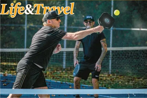  ?? JERRY JACKSON/STAFF PHOTOS ?? In addition to running and biking, Annapolis Mayor Gavin Buckley is an avid pickleball player. He plays at the Truxtun Park courts.