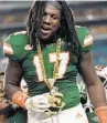  ?? MICHAEL LAUGHLIN/SUN SENTINEL ?? Miami’s Waynmon Steed shows off the turnover chain against Savannah State in 2018.