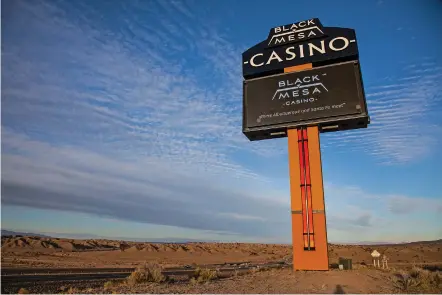  ?? PHOTOS BY GABRIELA CAMPOS/THE NEW MEXICAN ?? The new Black Mesa Casino sign 30 miles south of Santa Fe on Interstate 25 sits on Monday above the former San Felipe Casino. Tribal members wanted to give the casino a name more relevant to the pueblo, General Manager Steve Penhall said. Black Mesa is...
