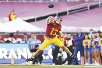  ?? RYAN SUN/AP ?? SOUTHERN CALIFORNIA QUARTERBAC­K CALEB WILLIAMS throws a pass during the second half of the team’s NCAA game against UCLA on Nov. 18, 2023, in Los Angeles.