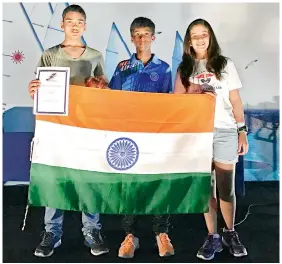  ??  ?? Hyderabad sailors Tanishq Desai, Durga Prasad and Juhi Desai pose with the Indian flag at the Asian Federation Youth Games in UAE.