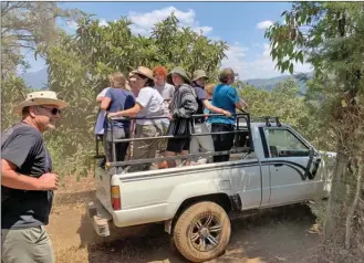  ?? Special to The Okanagan Weekend ?? Kelowna teacher Chris McGrath, left, led a group of students to Guatemala earlier this month. The group got stuck in the Central American country amid COVID-19 travel bans.