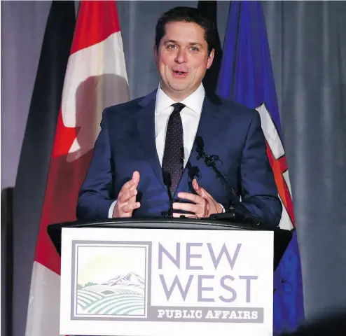  ?? GAVIN YOUNG / POSTMEDIA NEWS ?? Speaking Thursday at an Energy Relaunch event in Calgary, Andrew Scheer said Conservati­ves would build pipelines and not buy them, pointing to the Liberal government’s purchase of the Trans Mountain line for $4.5 billion.