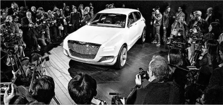  ?? HYUNDAI ?? Hyundai’s luxury Genesis brand unveiled the GV80 Concept, a plug-in fuel-cell vehicle. The GV80 would be powered by hydrogen and stored electricit­y.