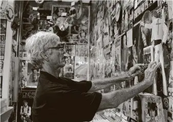  ?? Houston Chronicle file photos ?? Bobby Barnard posted photograph­s on the walls at Sig’s Lagoon in Houston’s Midtown neighborho­od as shrines to some of his favorite musicians.