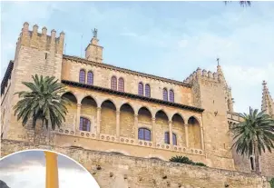  ?? ?? Above: With its Gothic arches and ornate interior, Mallorca's Almudaina Palace has a romantic atmosphere. Left: Expansive views from the grand terrace of Son Marroig mansion. Photos / Getty Images.