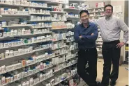  ??  ?? Robin Chang (left) and John Payne sell no cosmetics or groceries at their Grand Marais Pharmacy. “Our focus is 100 per cent on pharmacy,” Chang says.